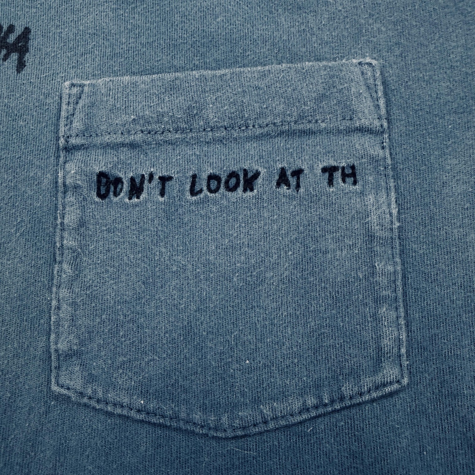 Uniqlo SPRZ NY Jean-Michel Basquiat Graphic Pocket Tee gallery