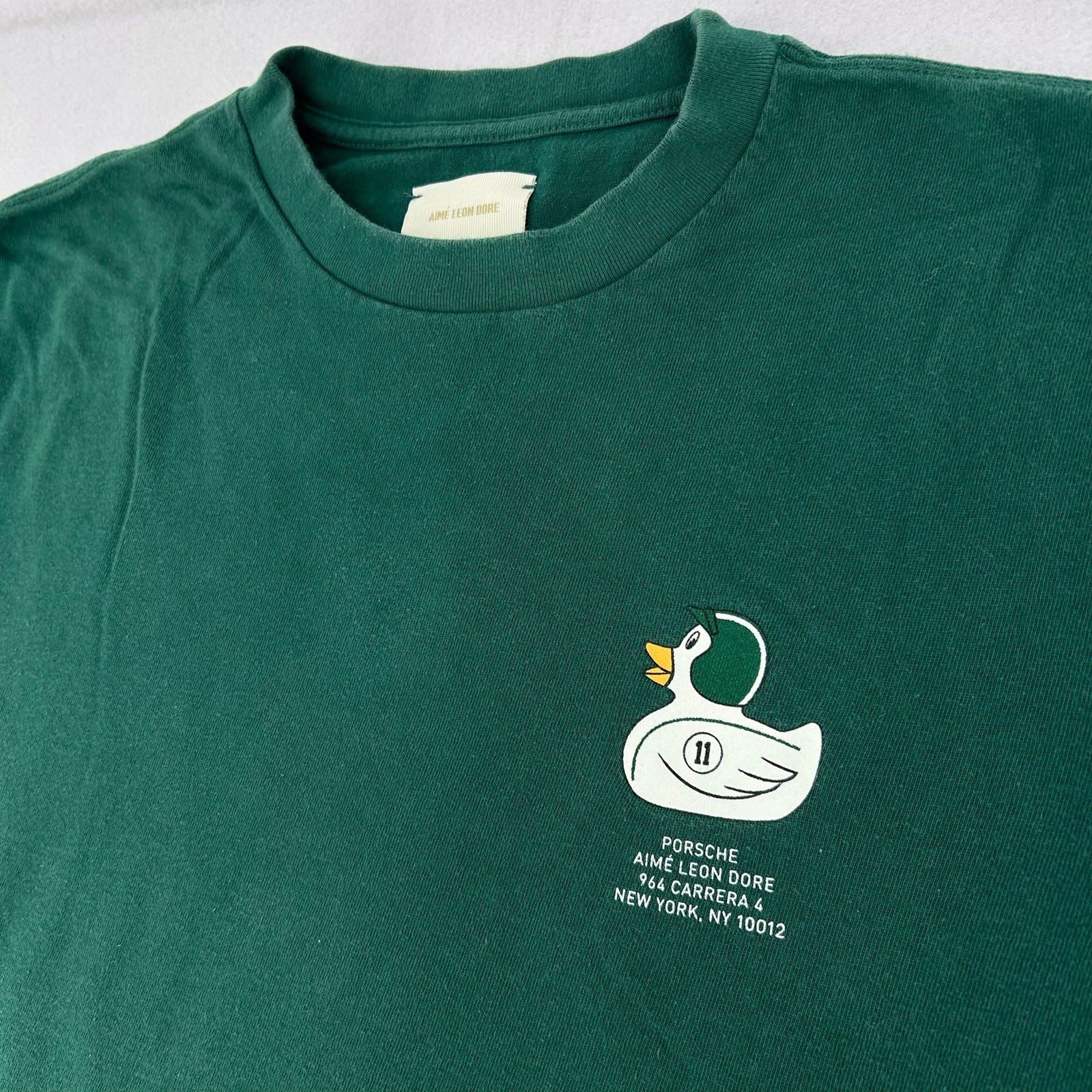 RARE Men's Green 2019 Aime Leon Dore x Porsche Duck Graphic Tee T Shirt Sz Med gallery