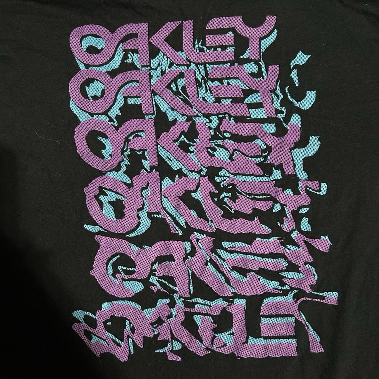 Oakley Black Short Sleeve T-shirt With Purple & Teal Graphic. Size Men’s L gallery