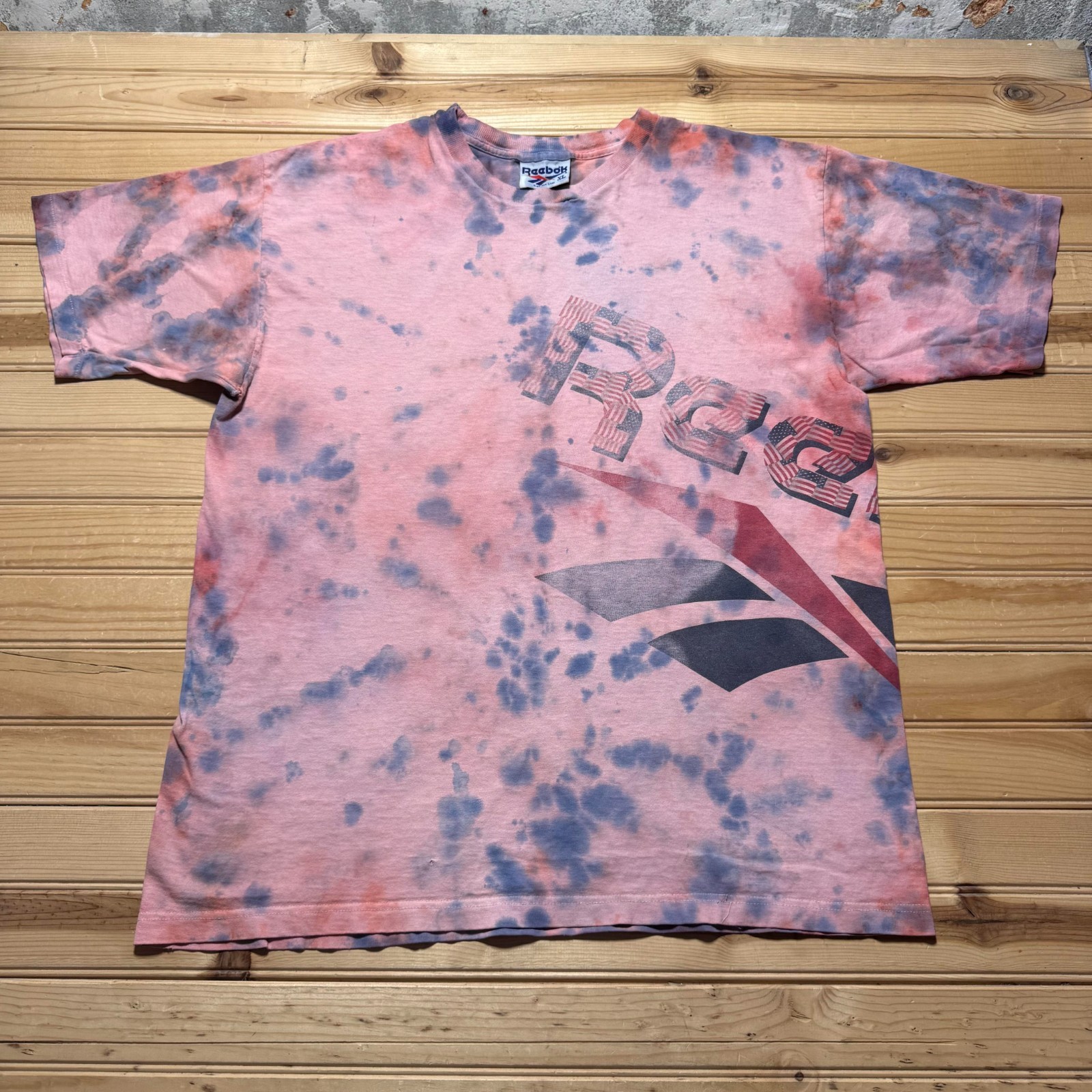 Vintage 90s Reebok American Flag Vector Logo Stars and Stripes Tie Dye Shirt XL gallery
