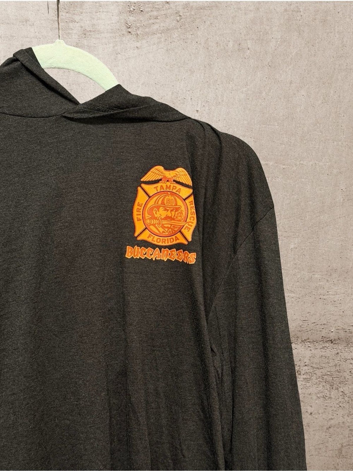 District Black Long-Sleeve Hooded Tee with Orange Badge gallery