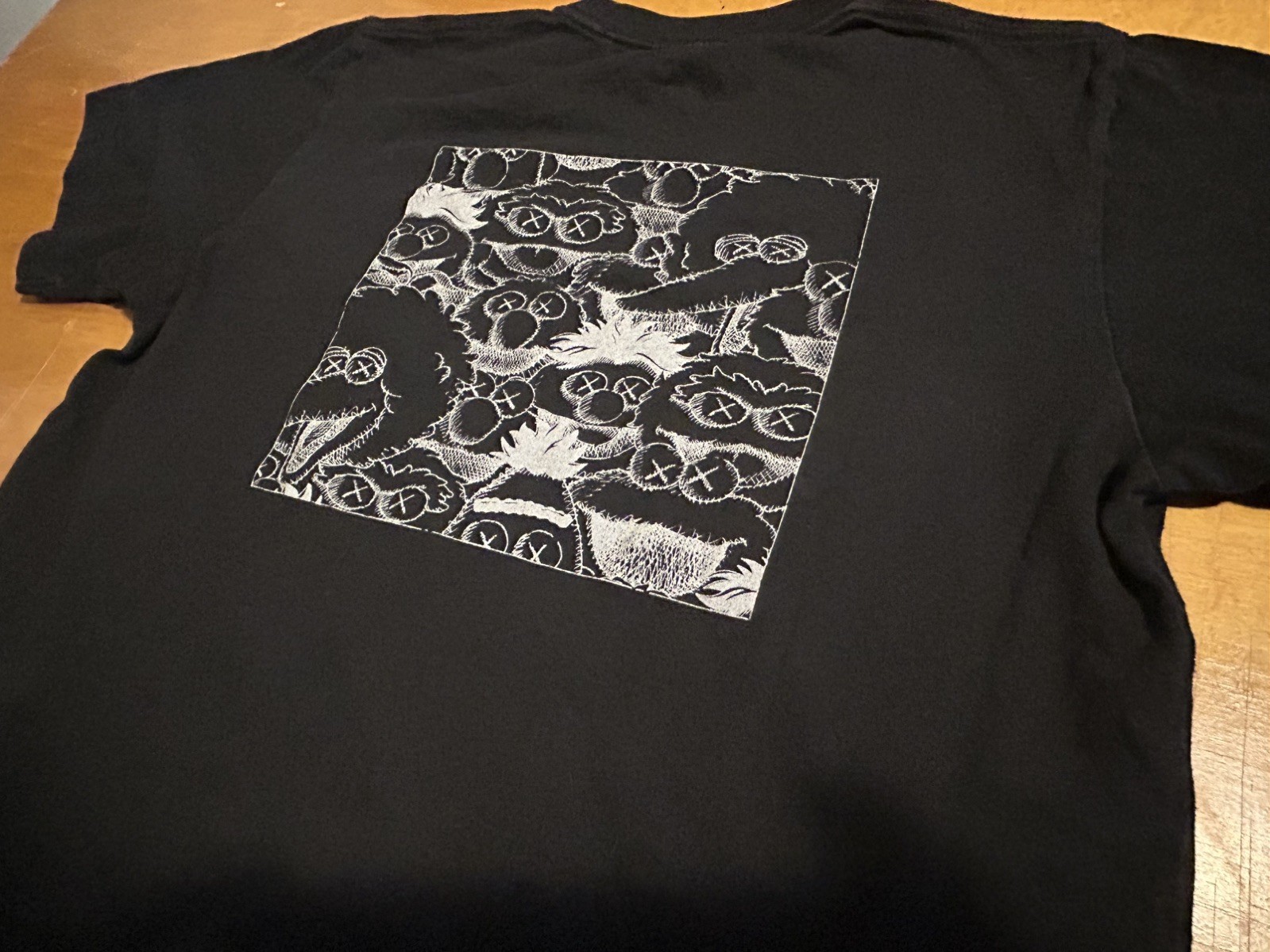 Uniqlo UT KAWS Sesame Street Shirt Mens XL Black Graphic Print Casual Pocket Tee gallery