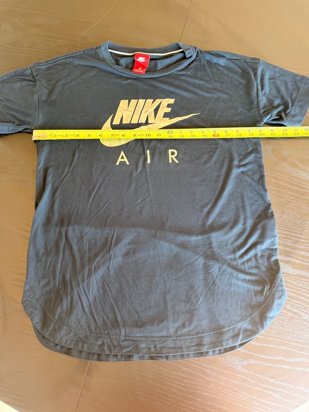 Vintage Nike Air Women's Metallic Gold Logo Curved Hem T-Shirt gallery