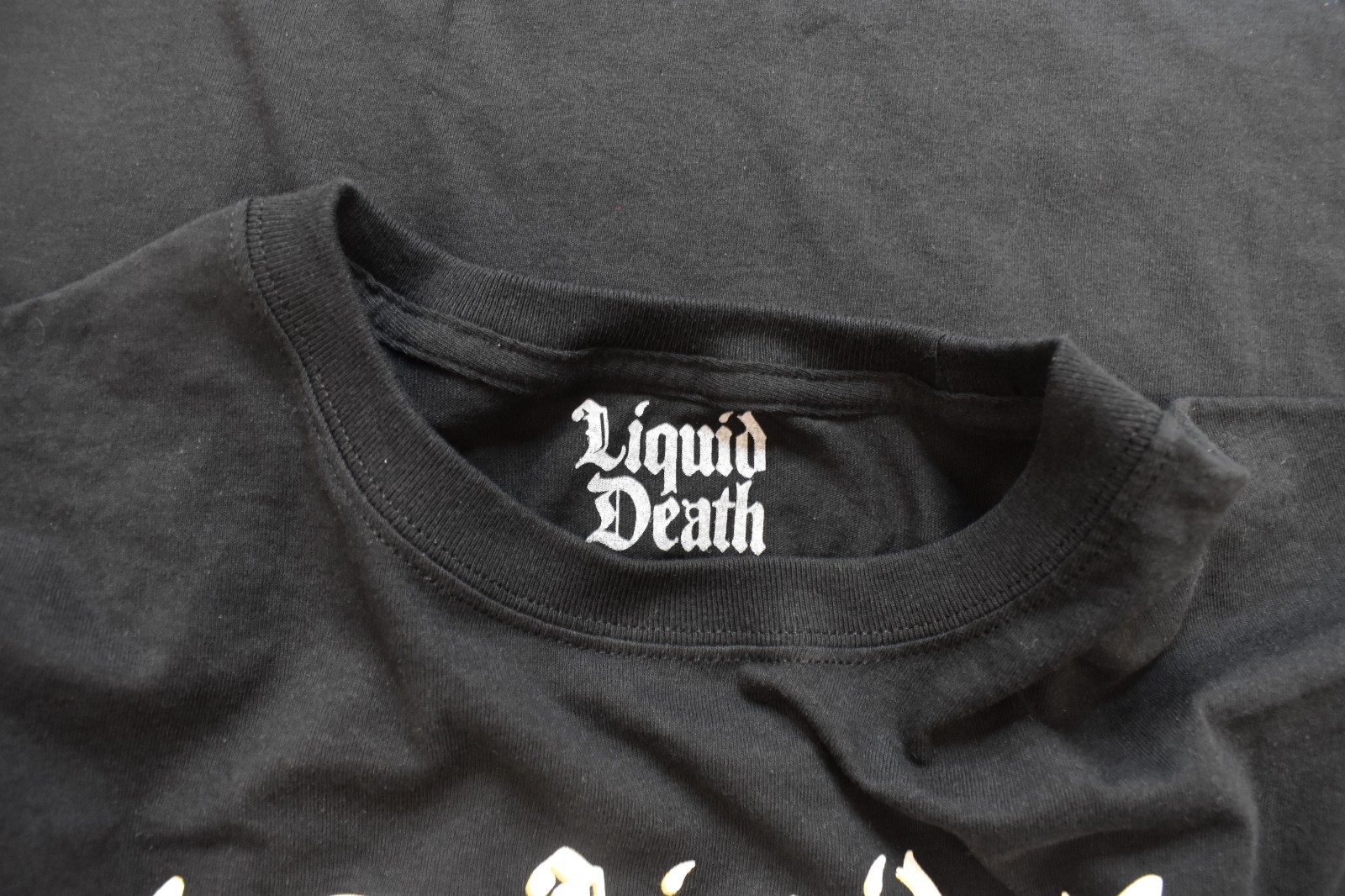 Liquid Death Mens Gold Skull Mountain Water Black Shirt New S-2XL gallery