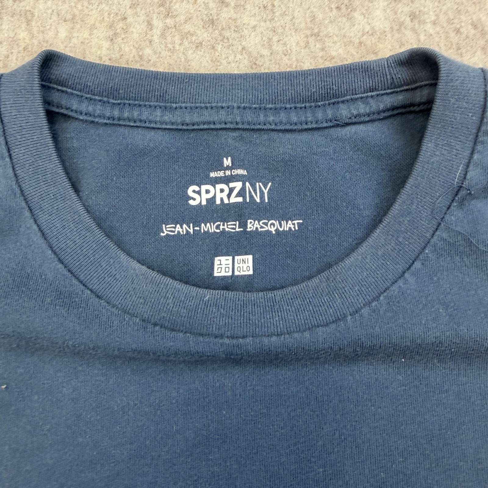 Uniqlo SPRZ NY Jean-Michel Basquiat Graphic Pocket Tee gallery