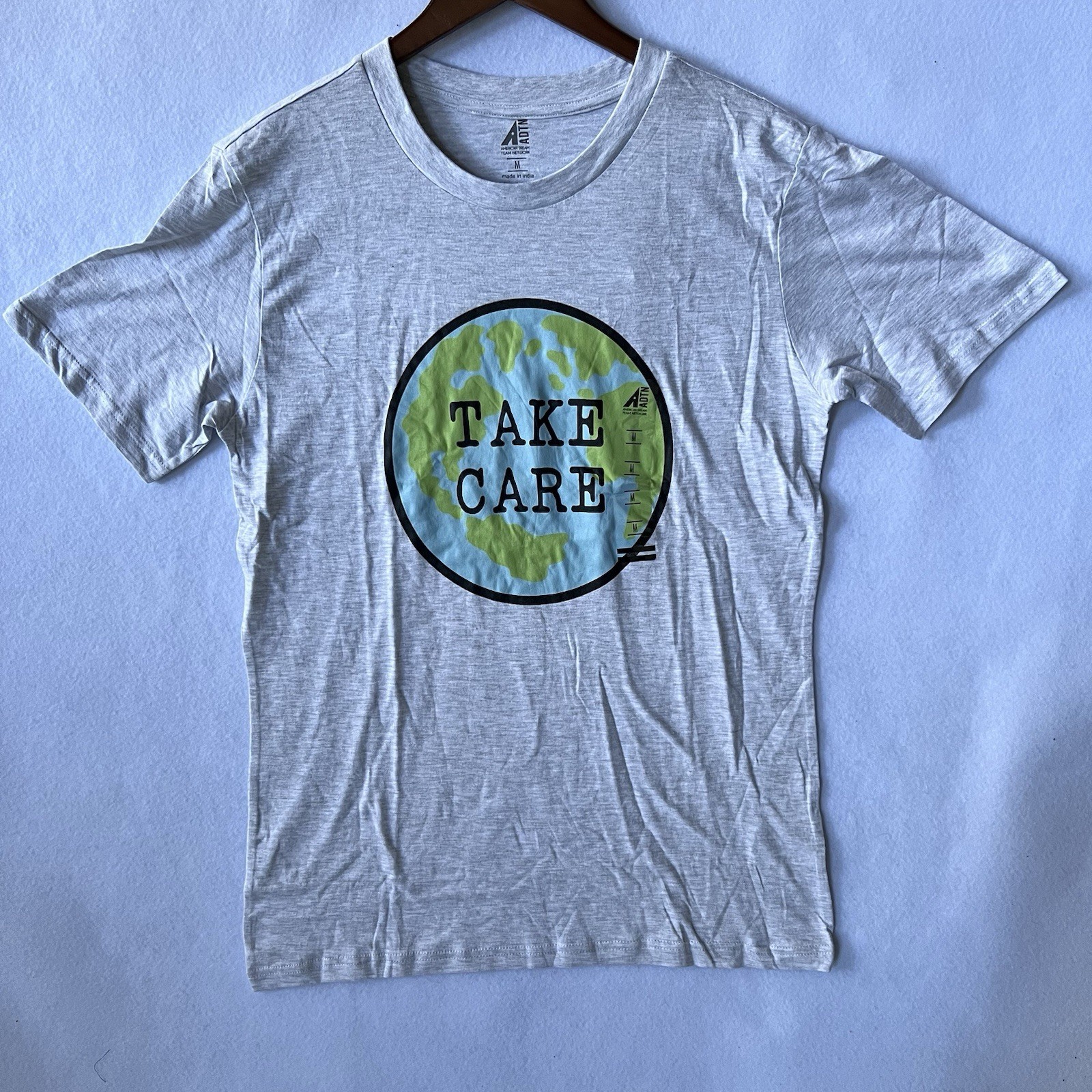 American Dream Network Take Care Size Medium Earth day gallery