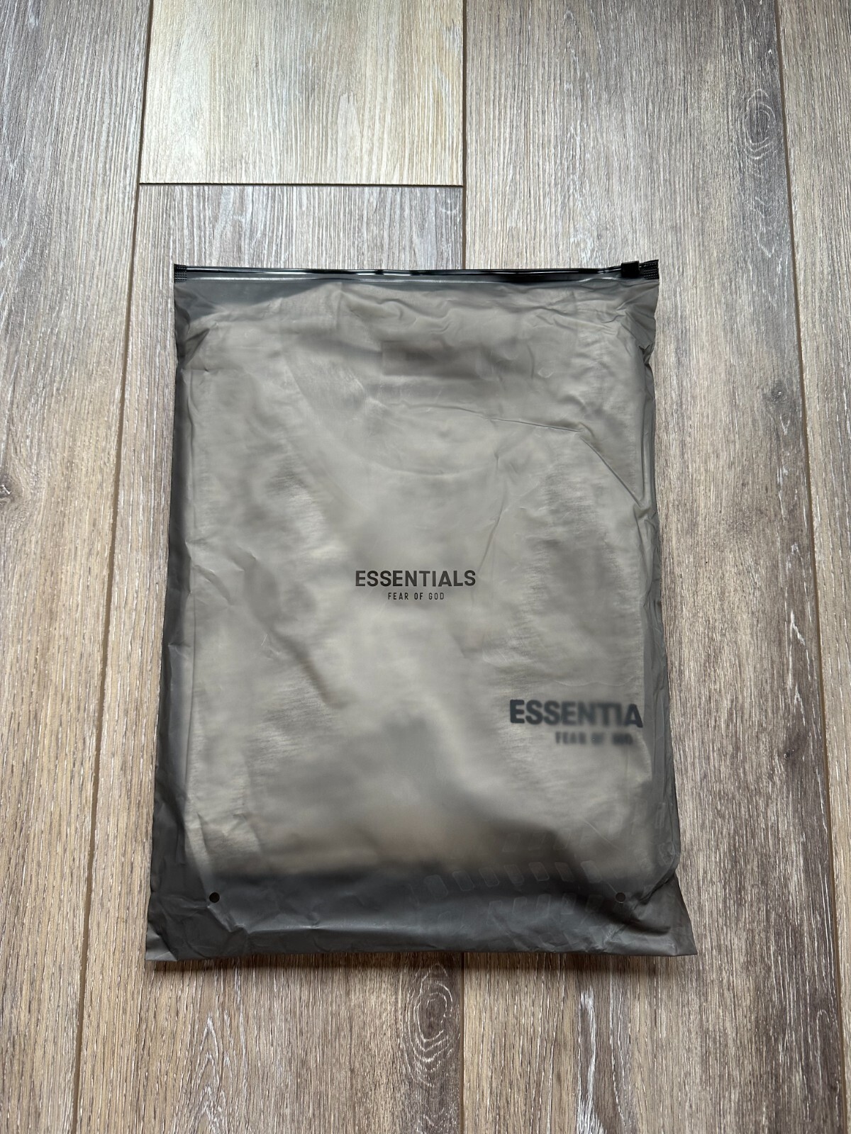 Fear of God Essentials Light Oatmeal Short Sleeve T-Shirt Sizes: XS-XXL gallery
