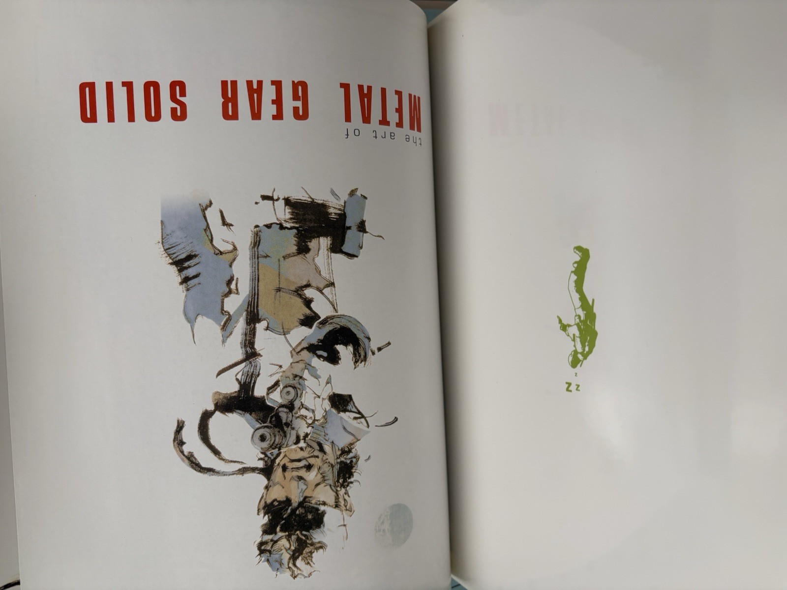 Metal Gear Solid collector lot with Uniqlo 25th Anniversary shirt gallery