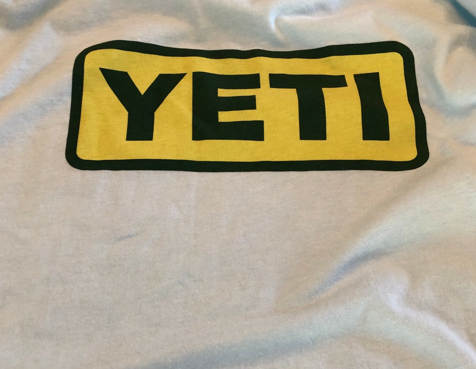 New NWT Yeti Ice Blue Logo Badge Size Small T-Shirt gallery