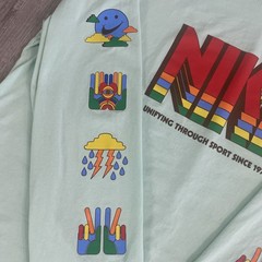 NIKE Unifying Through Sport Since 1972 Retro Logo , Mint Green LG Long Sleeve