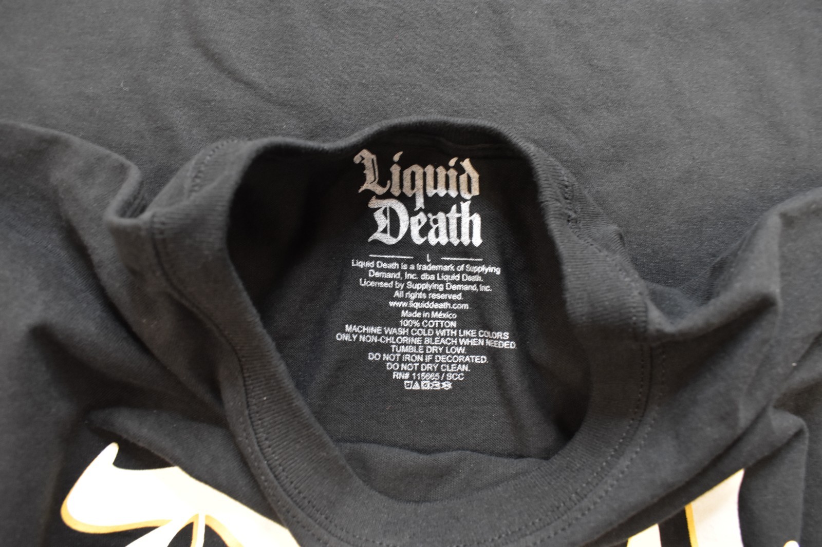 Liquid Death Mens Gold Skull Mountain Water Black Shirt New S-2XL gallery