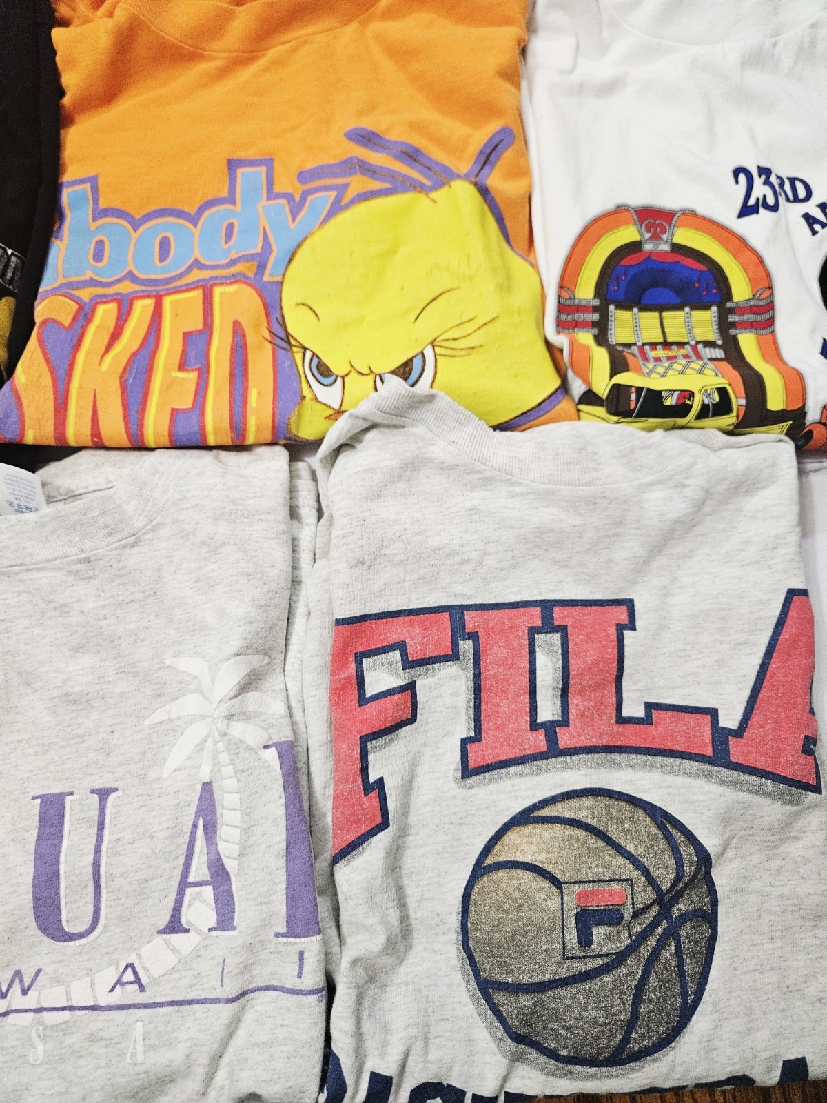 Vintage Lot Of 8 T-shirts Various Sizes Looney Tunes, NFL, Garfield, Ect. gallery