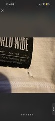 Nike world wide white t-shirt with multicolored Nike swoosh graphic