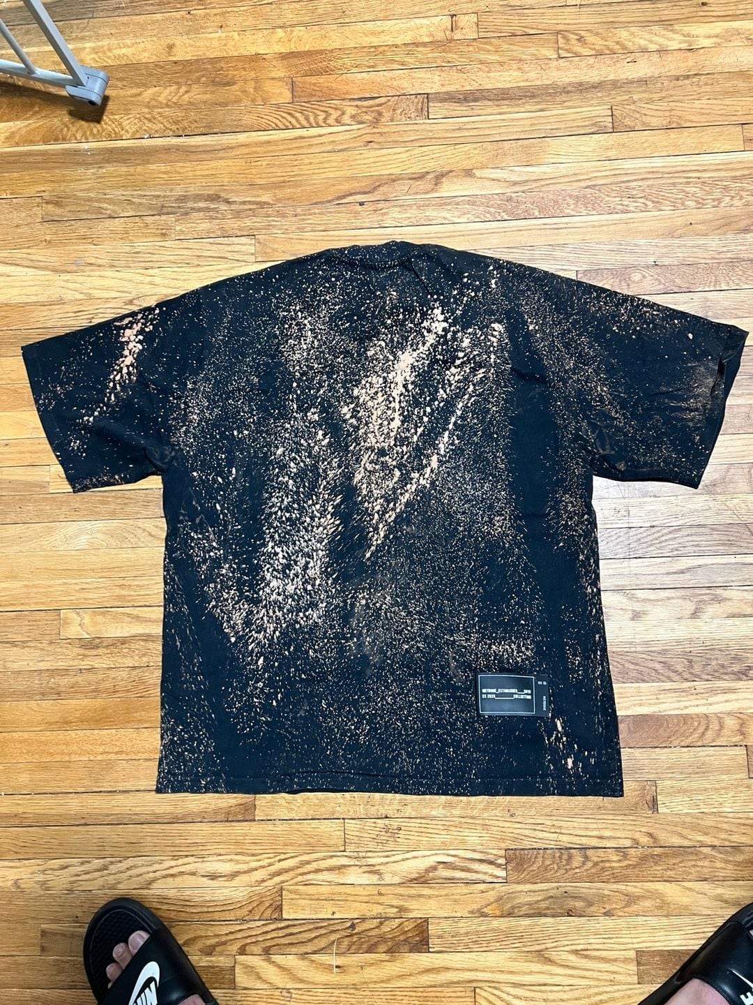 WE11DONE SS 2020 Multi-Bleach Splatter Logo Oversized T-Shirt gallery