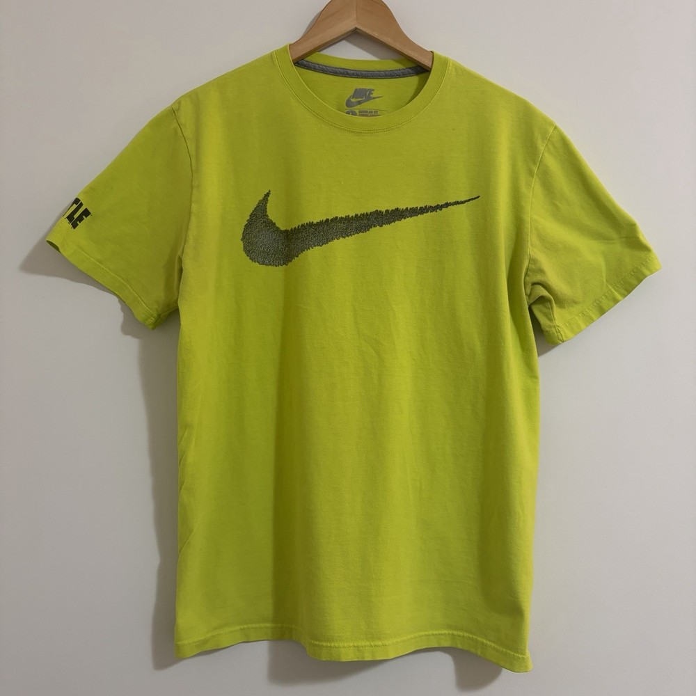 Nike ‘Hit It Hard’ green and yellow cotton t-shirt. Made in El Salvador. Size L