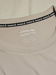 Reebok Men’s Pale Pink Athletic Tee