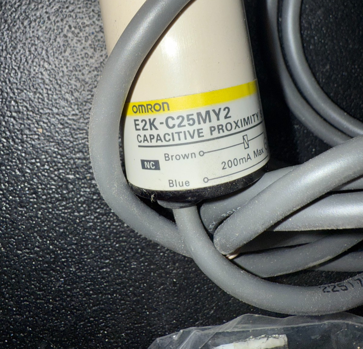 New In Box OMRON E2K-C25MY2 Proximity Sensor With Mounting Bracket.