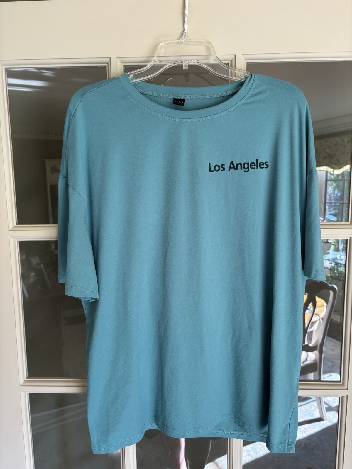 Blue and black Los Angeles T-shirt size medium. Short sleeve. 95/5 poly/elastane gallery