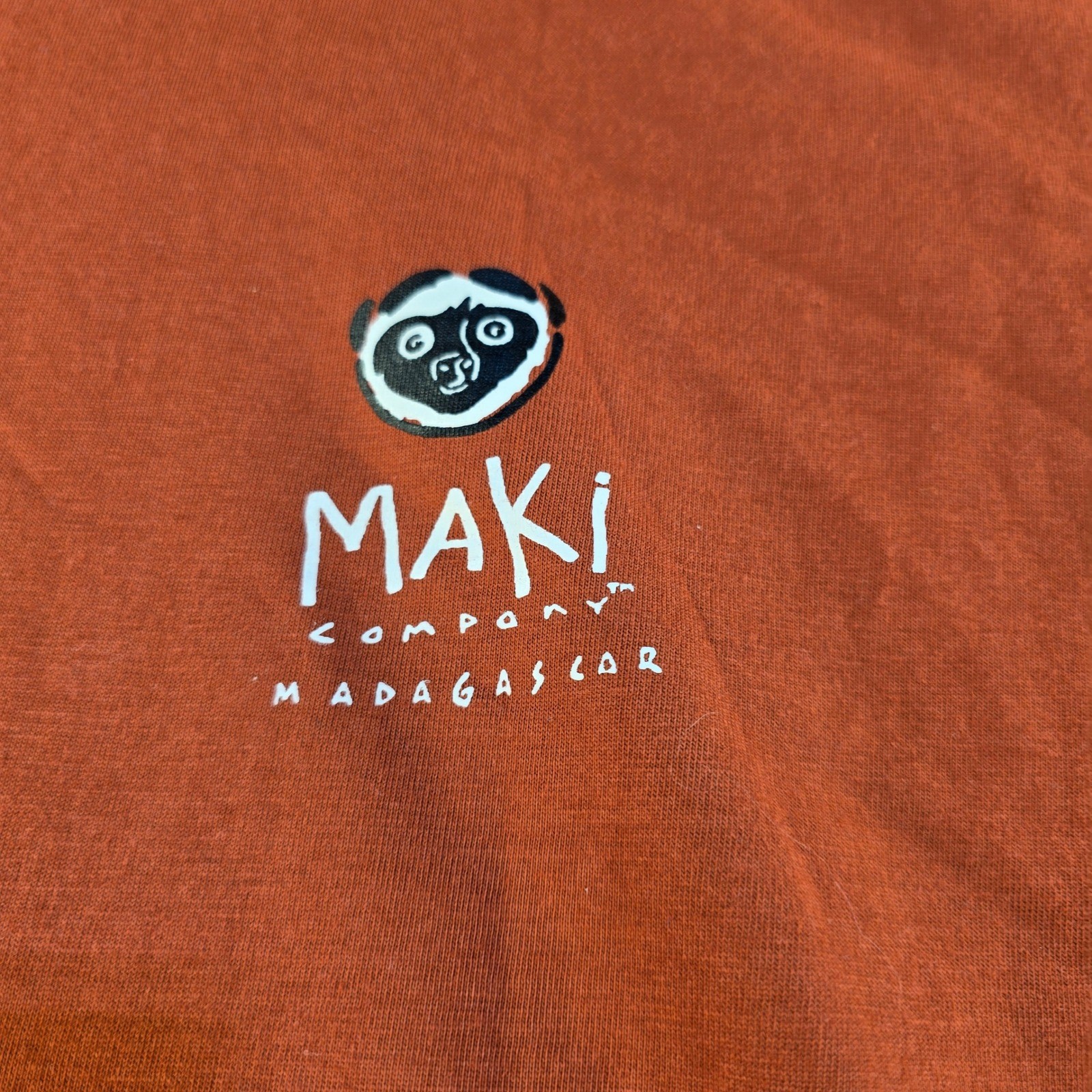 Maki Company Madagascar Lemurs Land Graphic T-Shirt Burnt Orange Mens Medium gallery