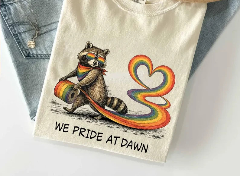 We Pride At Dawn Shirt, LGBTQ Raccoon Pride Tee, Rainbow Heart Graphic T-Shirt,