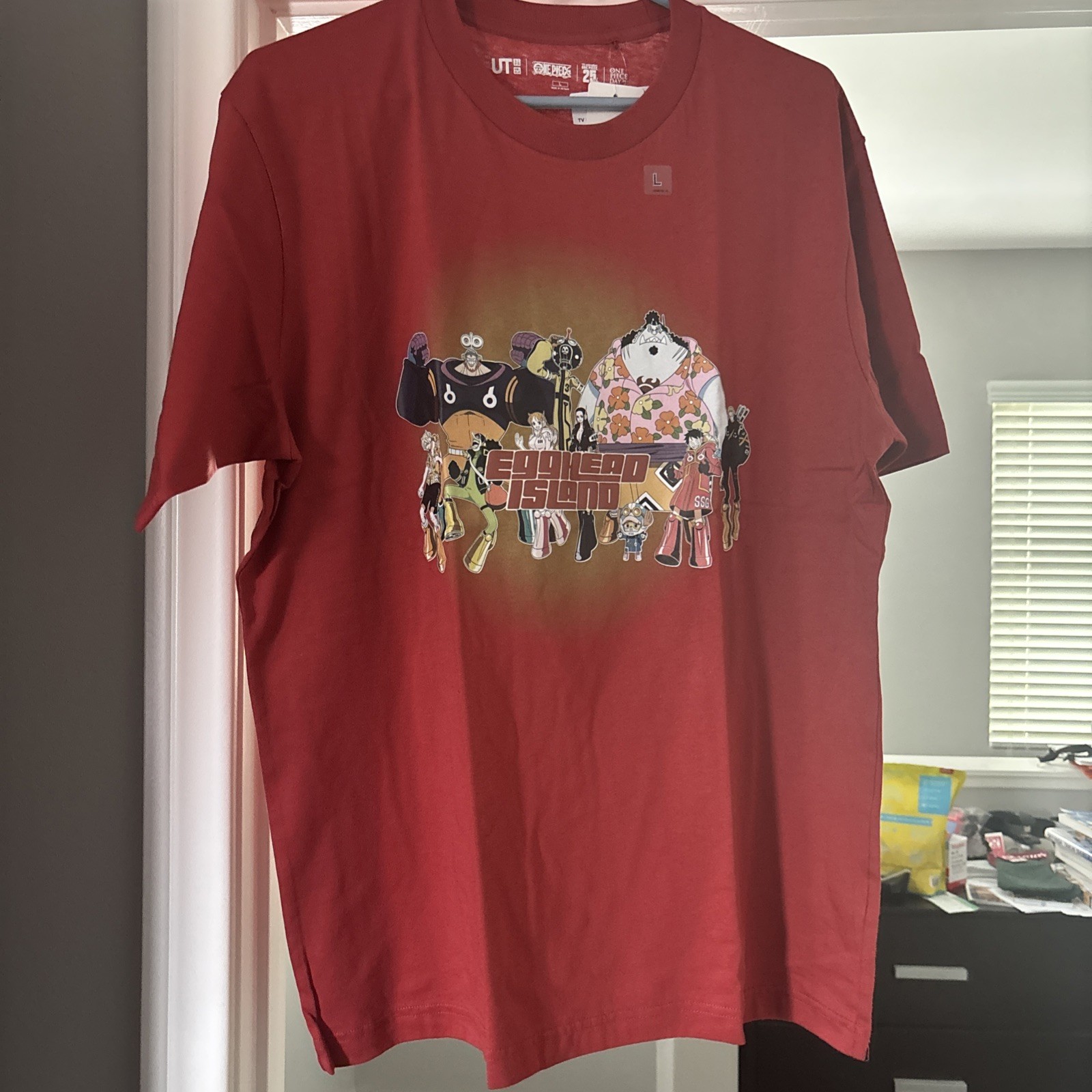 UNIQLO ONE PIECE EGGHEAD ISLAND 25TH ANNIVERSARY DARK ORANGE TSHIRT SIZE L NWT gallery
