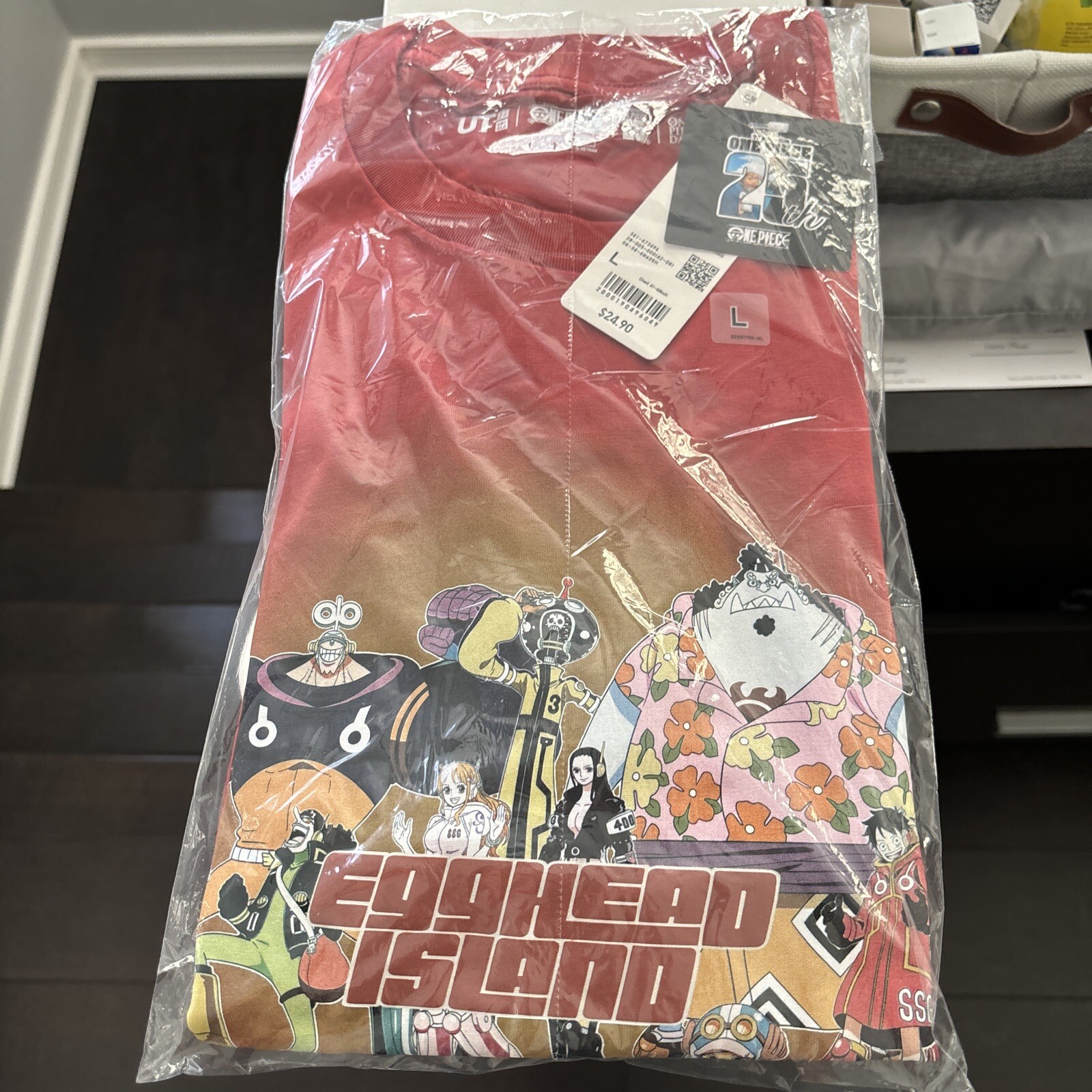UNIQLO ONE PIECE EGGHEAD ISLAND 25TH ANNIVERSARY DARK ORANGE TSHIRT SIZE L NWT gallery