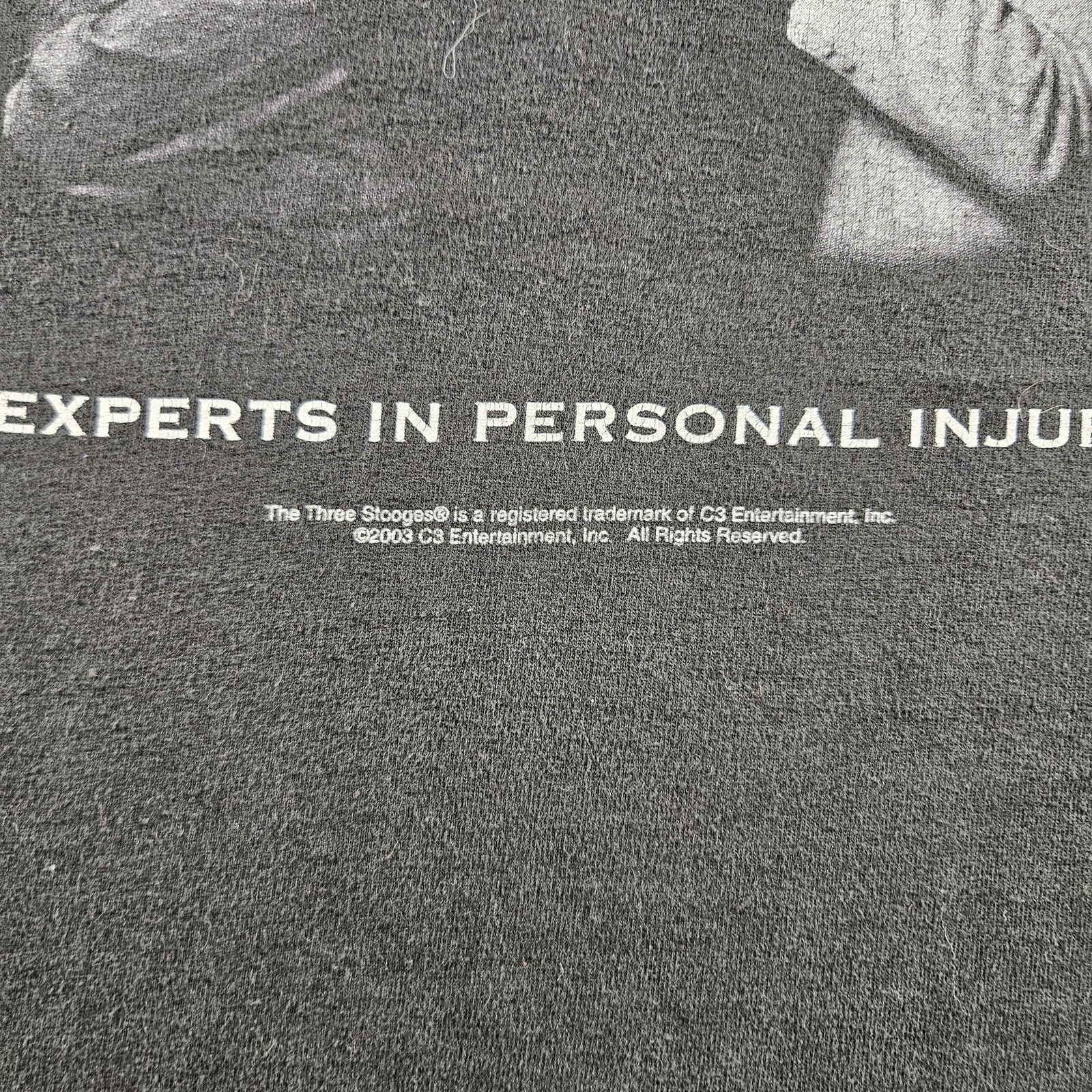 Vintage The Three Stooges Law Firm Experts In Personal Injury Black T-Shirt XL gallery