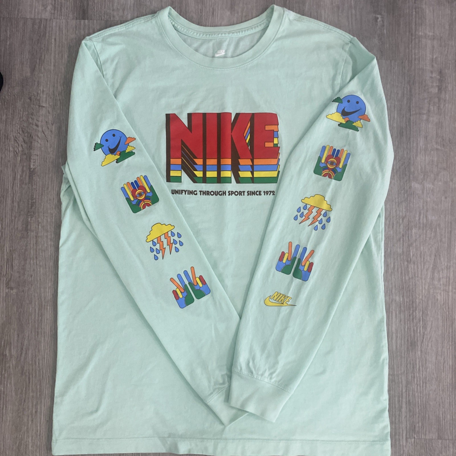 NIKE Unifying Through Sport Since 1972 Retro Logo , Mint Green LG Long Sleeve gallery