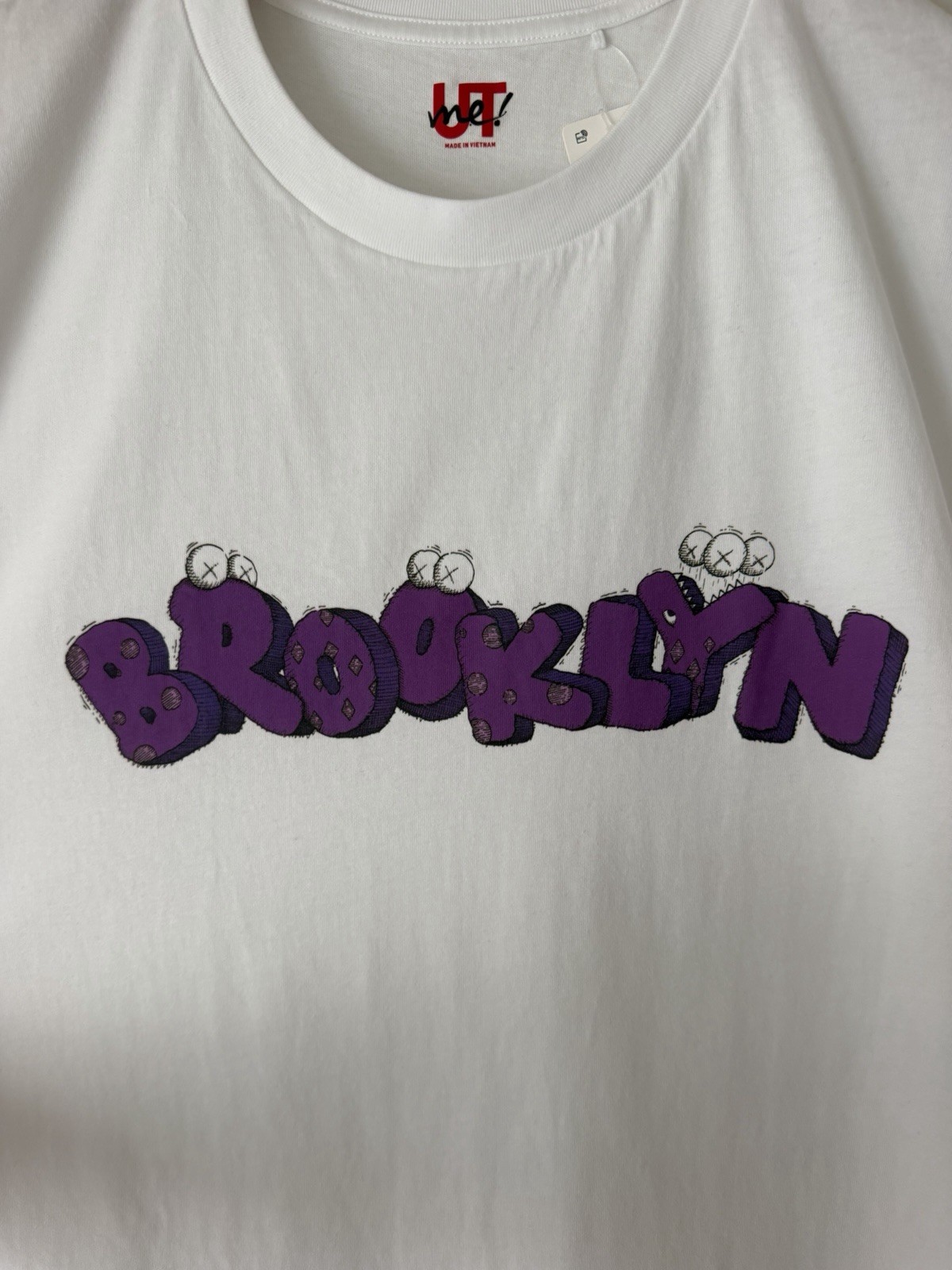 KAWS x Uniqlo Brooklyn Williamsburg Grand Opening Tee Purple White Unisex XL gallery