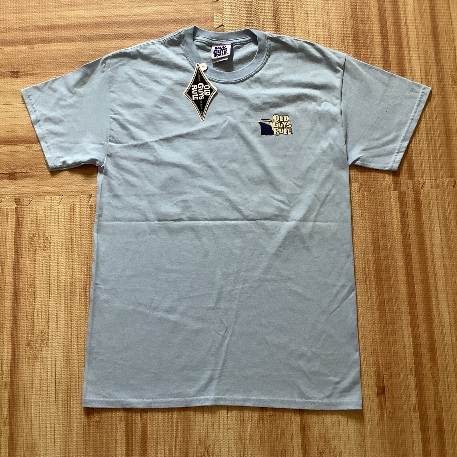 OLD GUYS RULE Cruising Through Life Men’s Blue T-shirt – Size M – New With FLAW