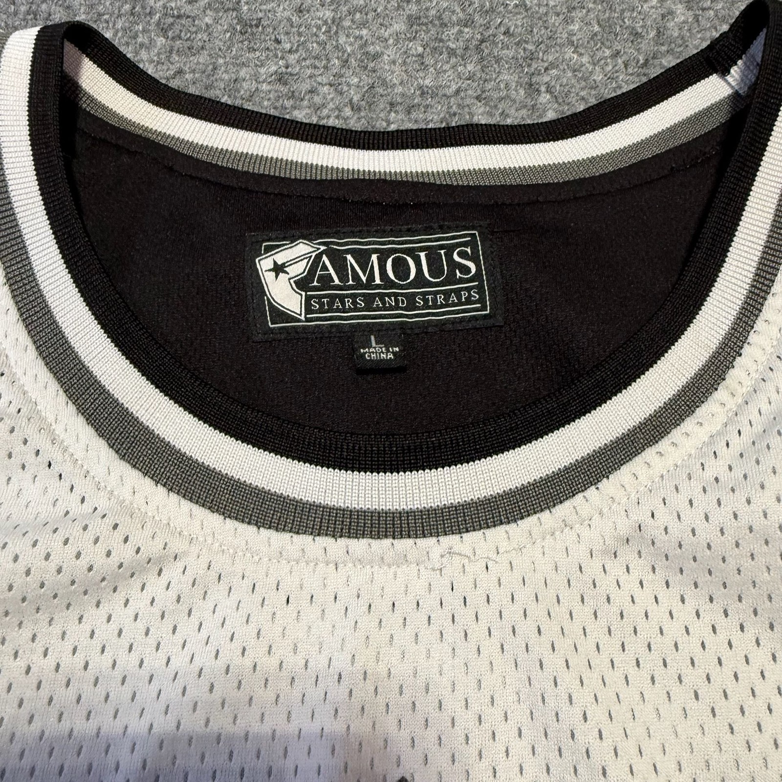 Vintage Famous Stars and Straps Tri-Star Reversible Mesh Jersey Tank Top gallery