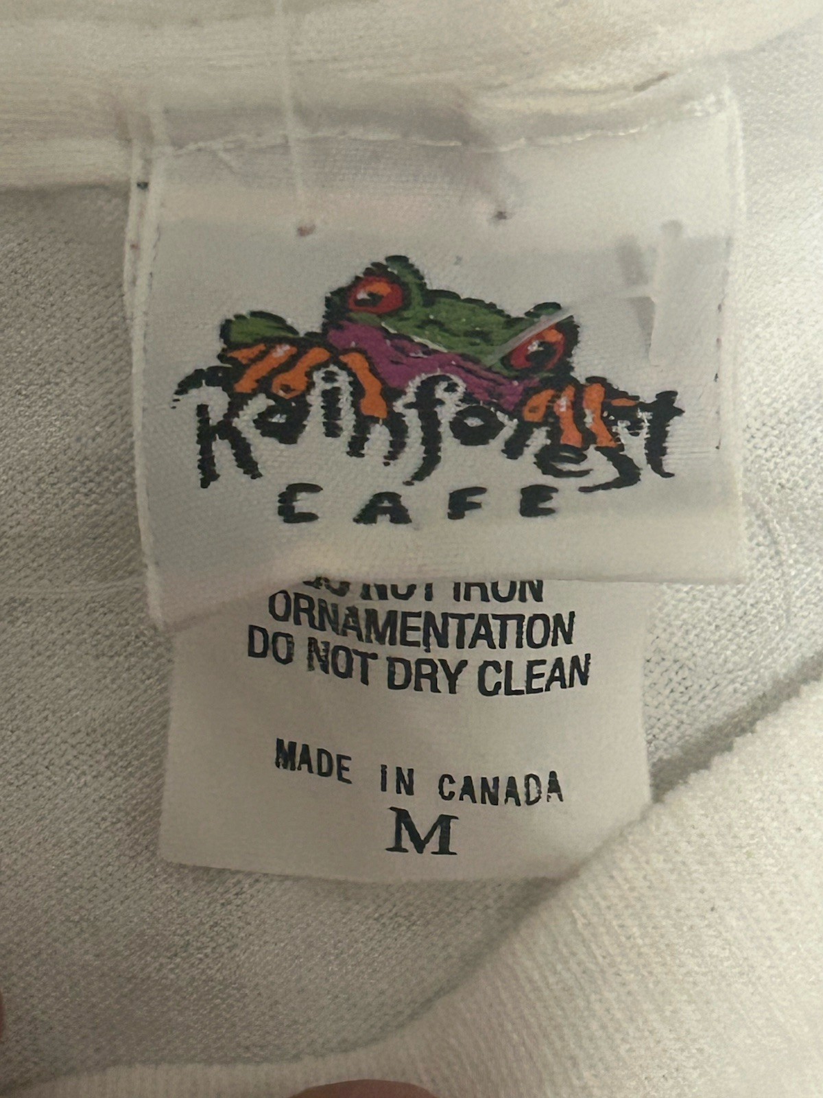90s vintage white Rainforest Cafe graphic t-shirt. Sz Medium gallery