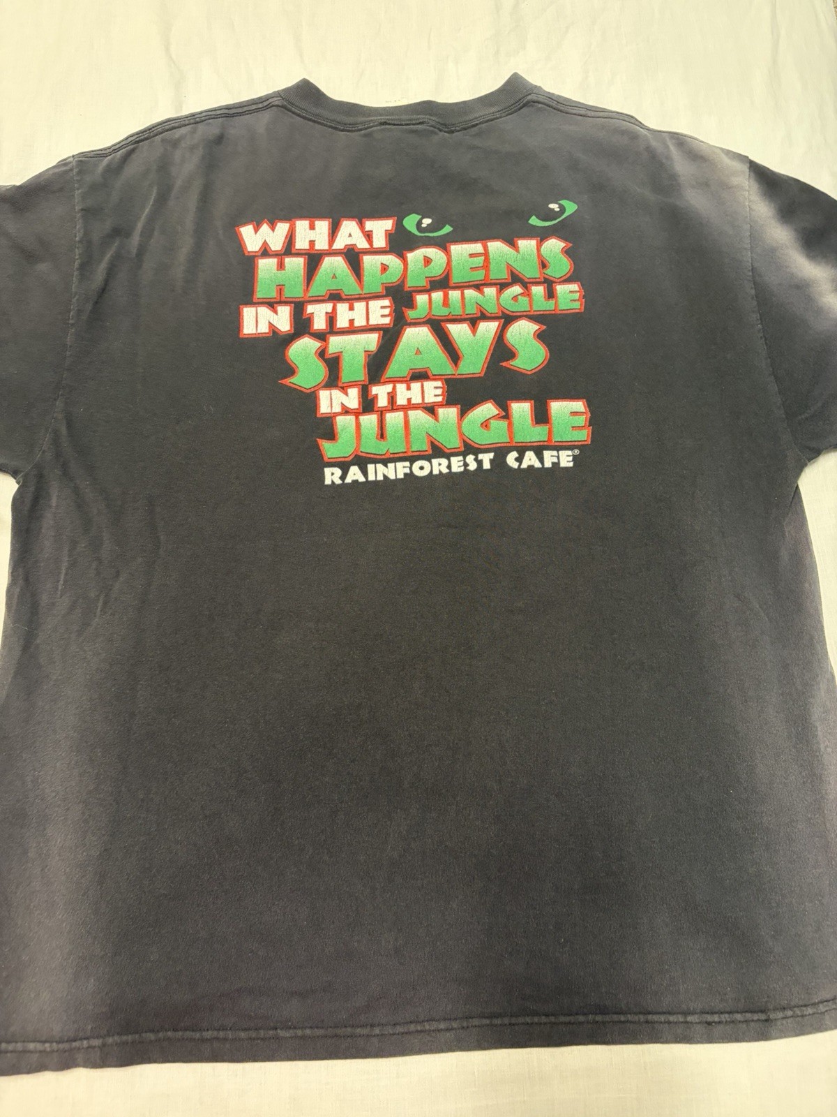 Vtg Rainforest Cafe Orlando XL Black Faded What Happens In The Jungle Stays gallery