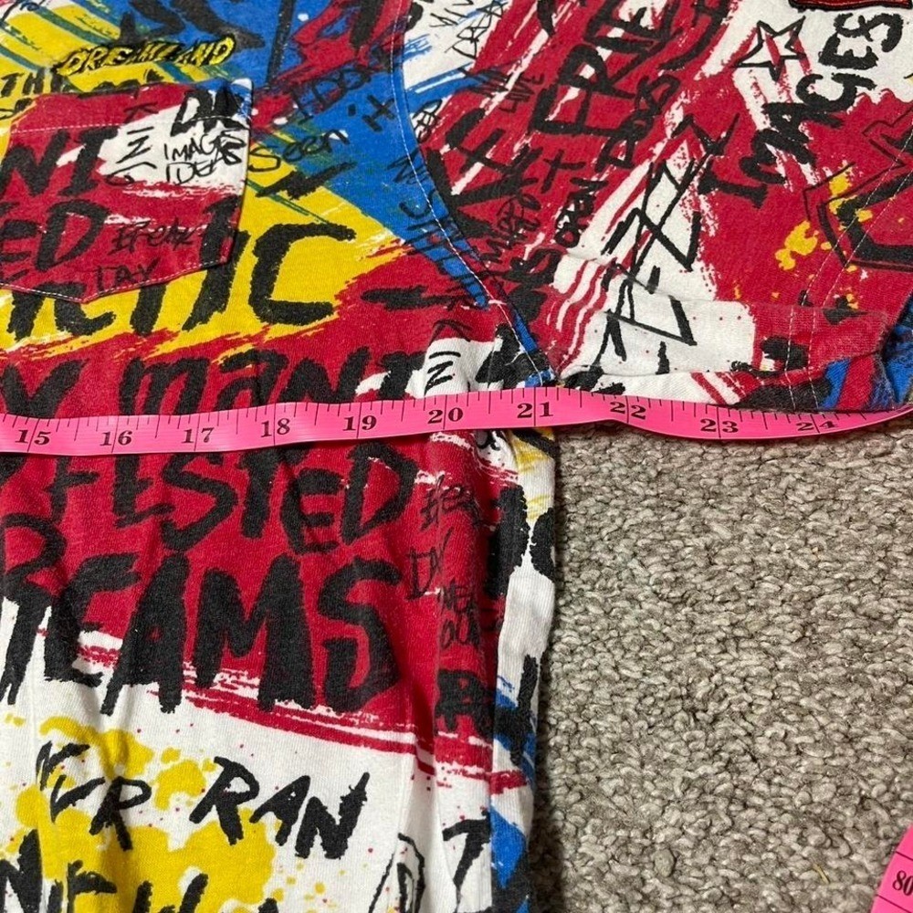 Multicoloured graffiti style graphic tee with bold designs gallery