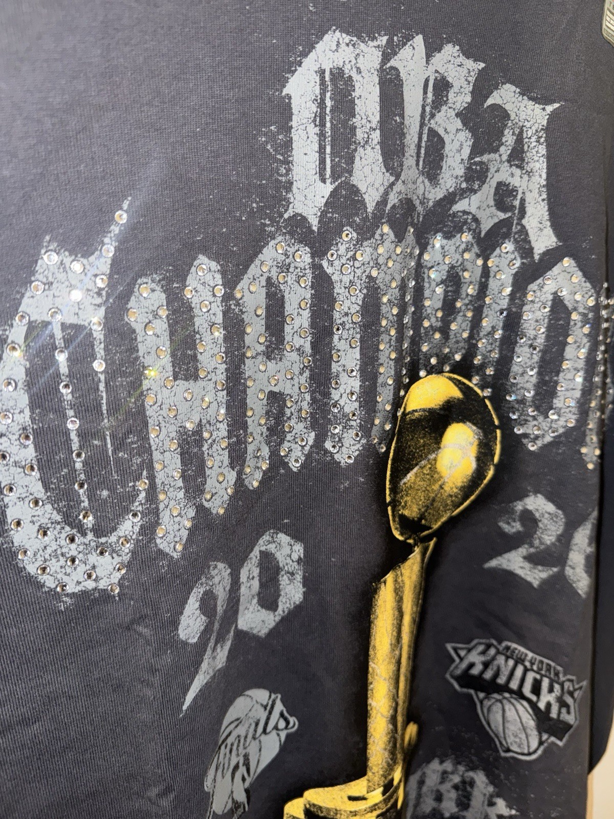 New York Knicks Nike 2026 NBA Champions Locker Room On Court Rhinestone T-Shirt gallery