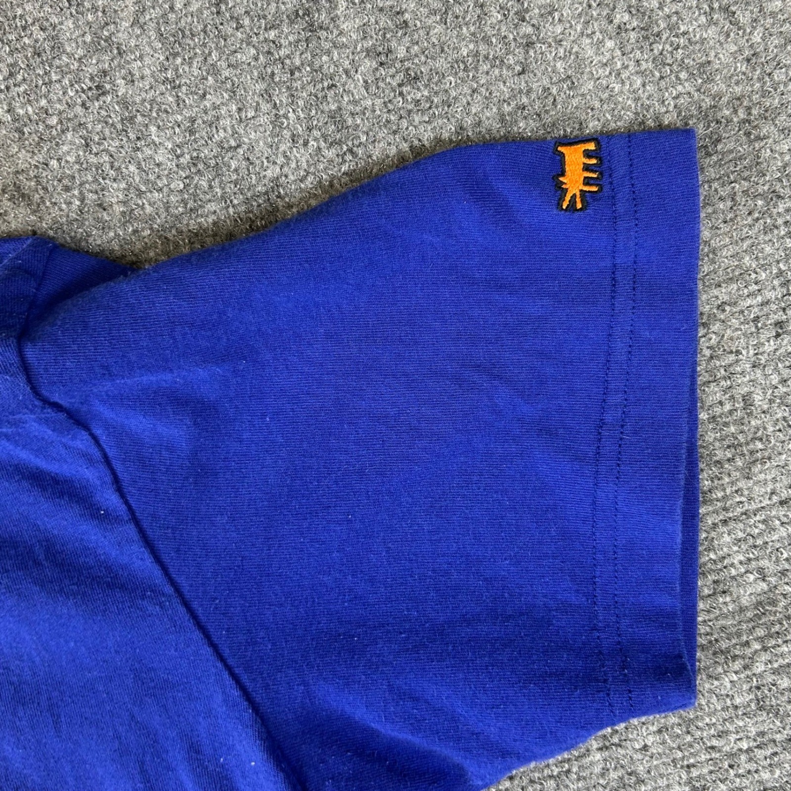 Uniqlo SPRZ NY Keith Haring MoMA Radiant Baby Blue Orange Graphic T-Shirt L gallery