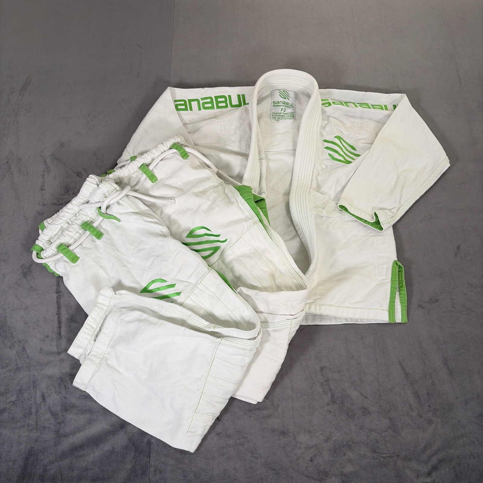 Sanabul Youth Gi Size F2 White with Green Accent Top & Two Pants Bnfts Charity