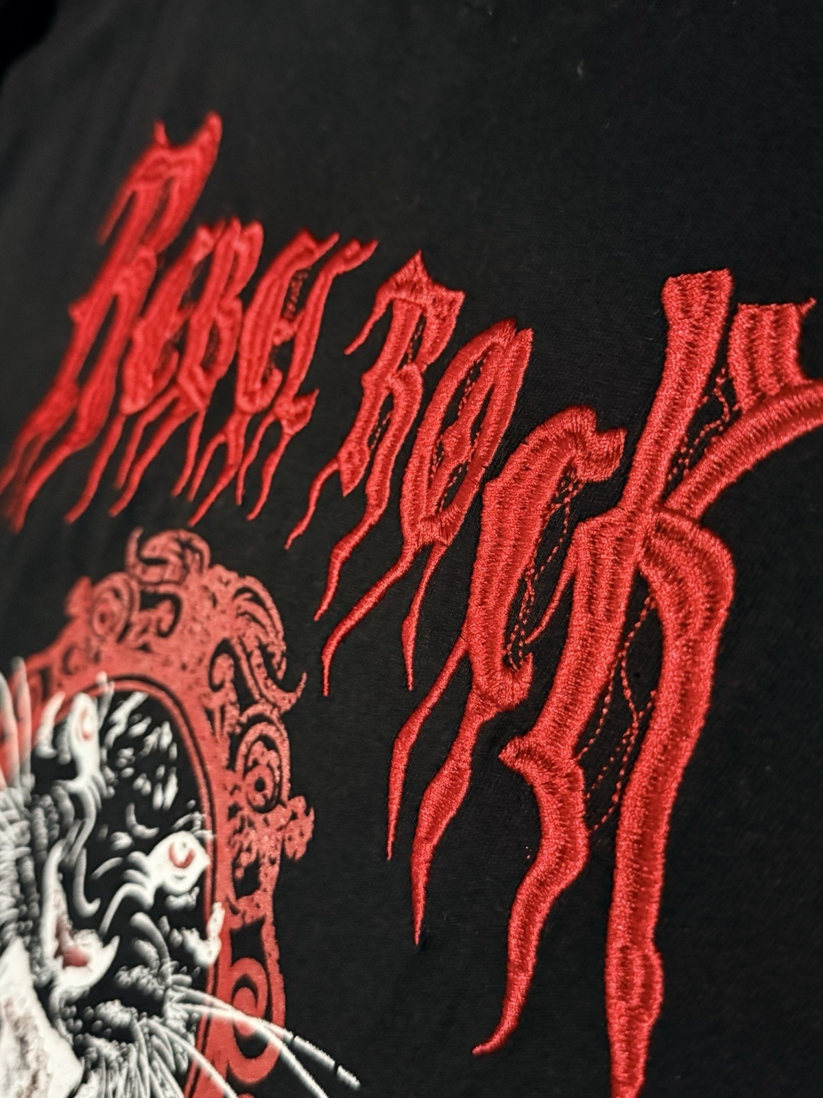 black cotton t-shirt features a bold red embroidered panther graphic Size Small gallery