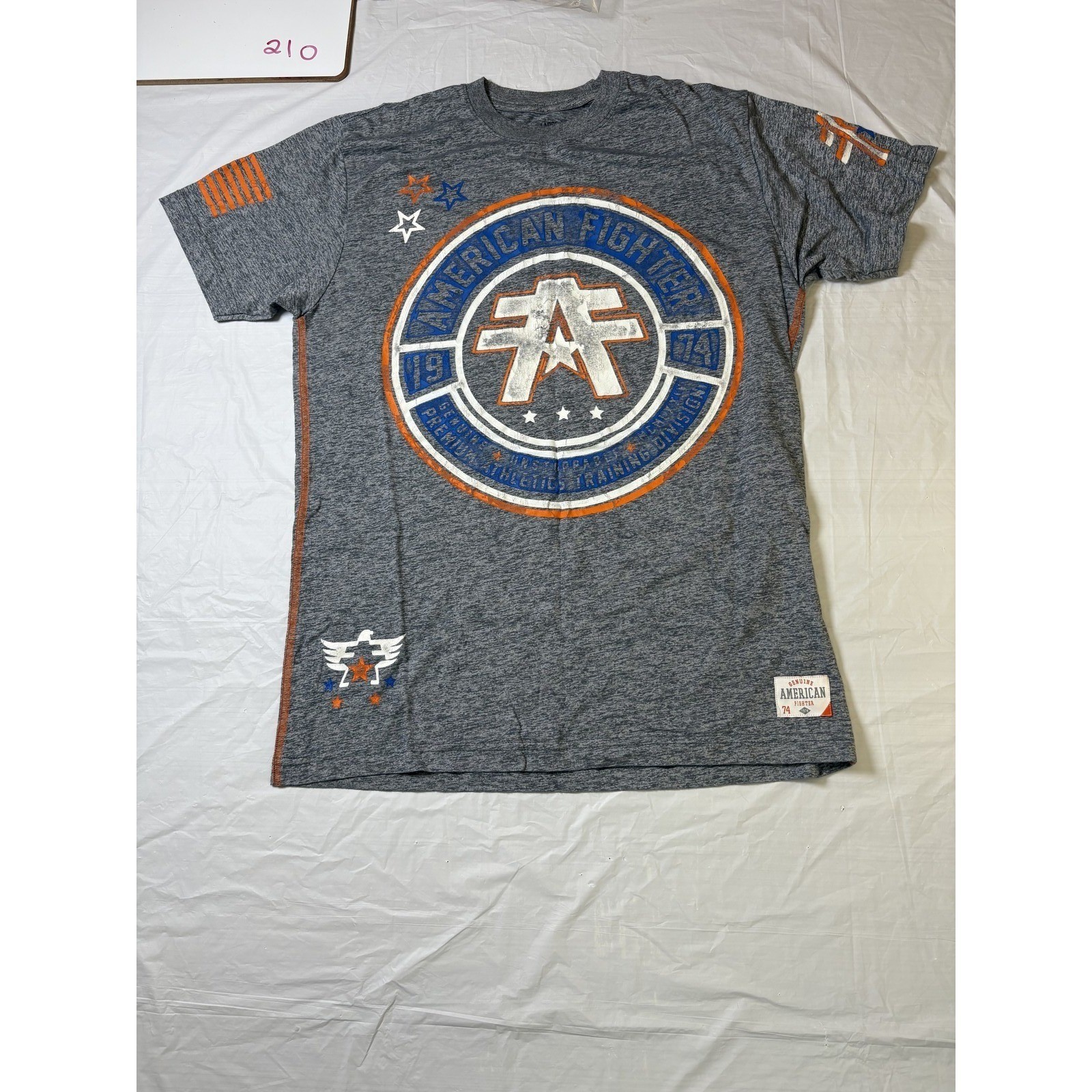 Mens American Fighter gray/orange/blue/white graphic tshirt, size Large