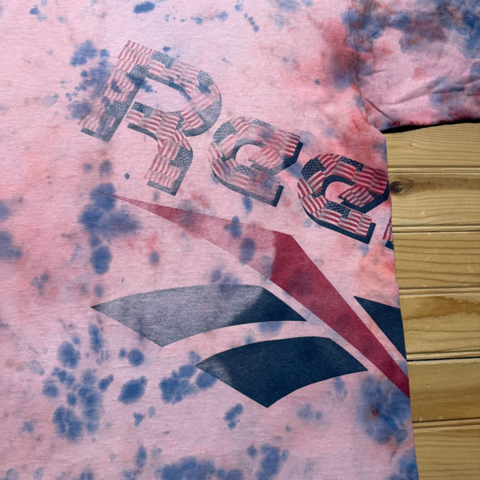 Vintage 90s Reebok American Flag Vector Logo Stars and Stripes Tie Dye Shirt XL gallery