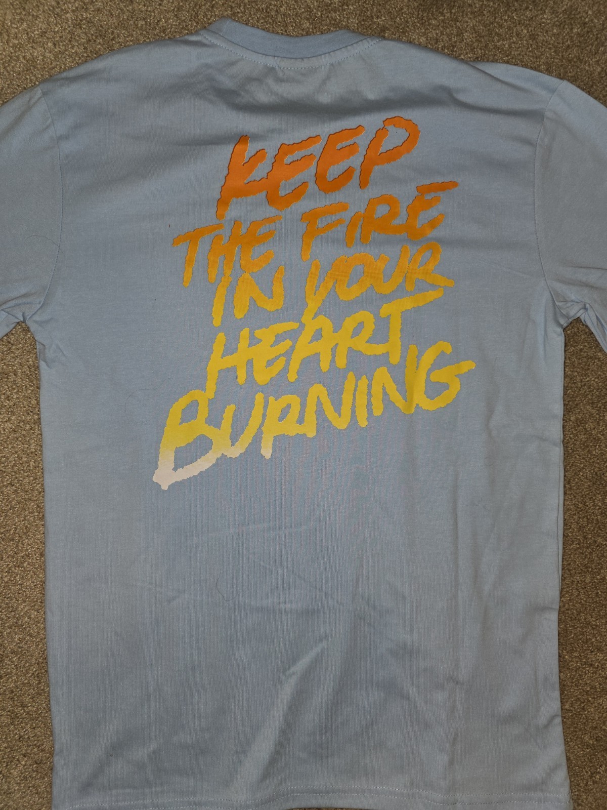 Fire & ice Orange short sleeve Genuine Merchandise Light Blue T-shirt Small