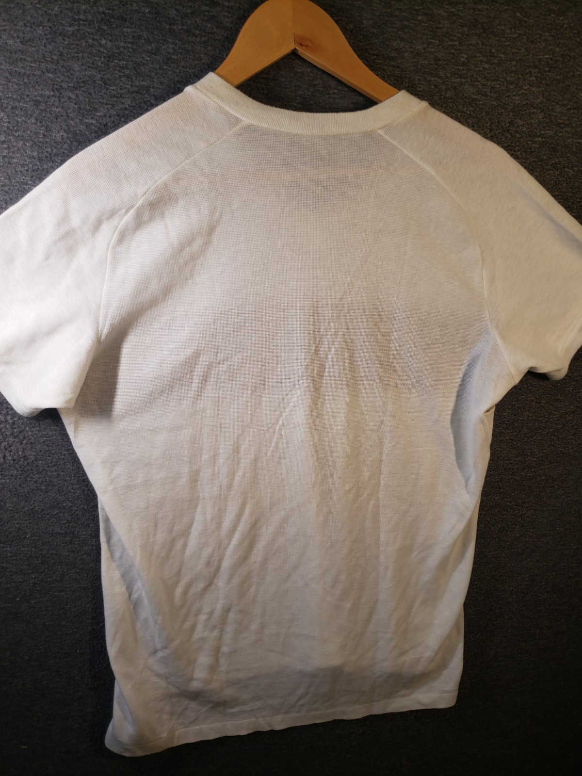 Vintage L Nike V-neck t-shirt textured knit fabric gallery