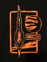 B & C Collection Men’s Extra Large Black T-Shirt With Neon Orange Graphics