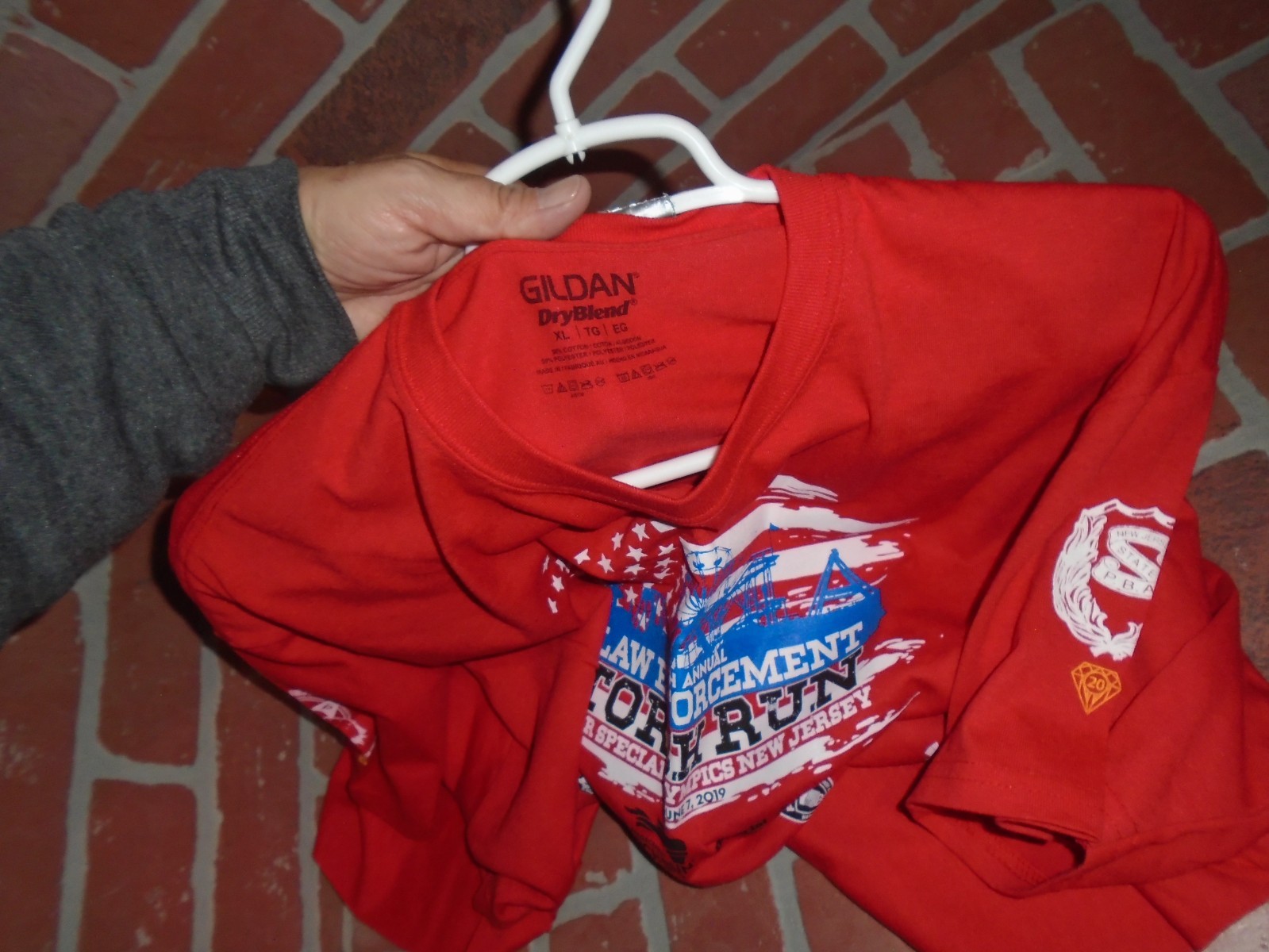 36TH ANNUAL LAW ENFORCEMENT TORCH RUN 2019 MENS TSHIRT WORN 1 TIME gallery