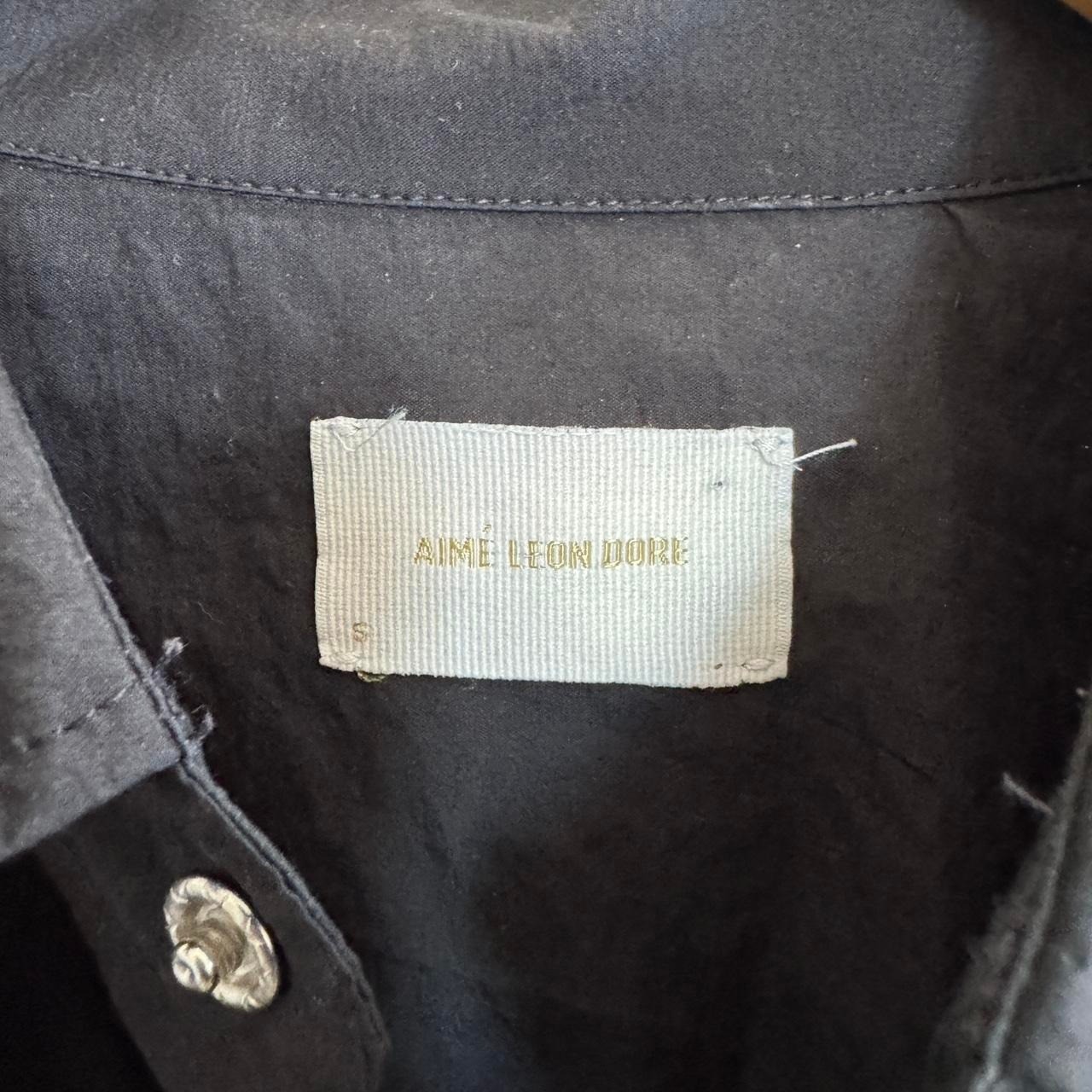 Aime Leon Dore black button up shirt Size S but can fit medium. gallery