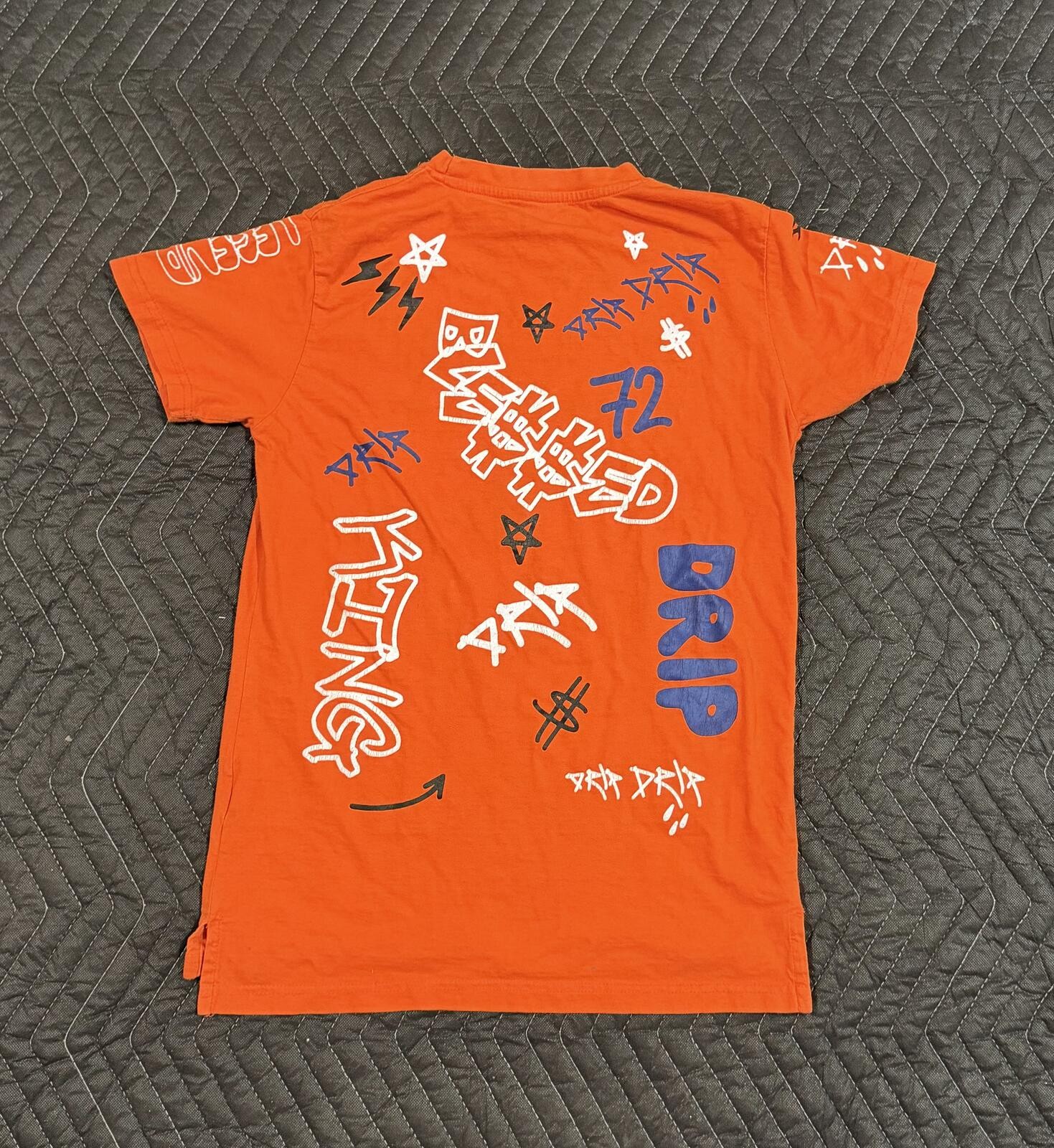evolution in design Orange Graphic Print T-Shirt gallery