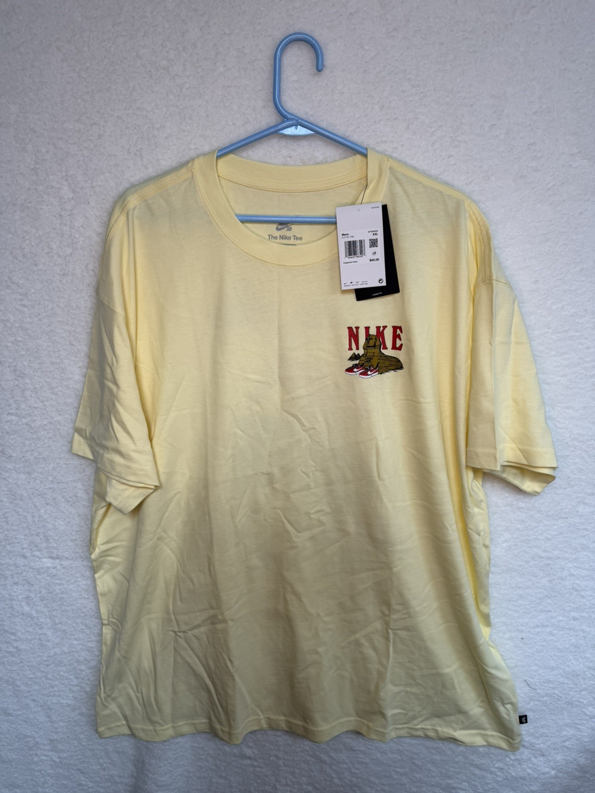 NEW Nike SB Men's T-Shirt Sphinx Bike Pale Vanilla Yellow XL FJ1141-744 NWT gallery