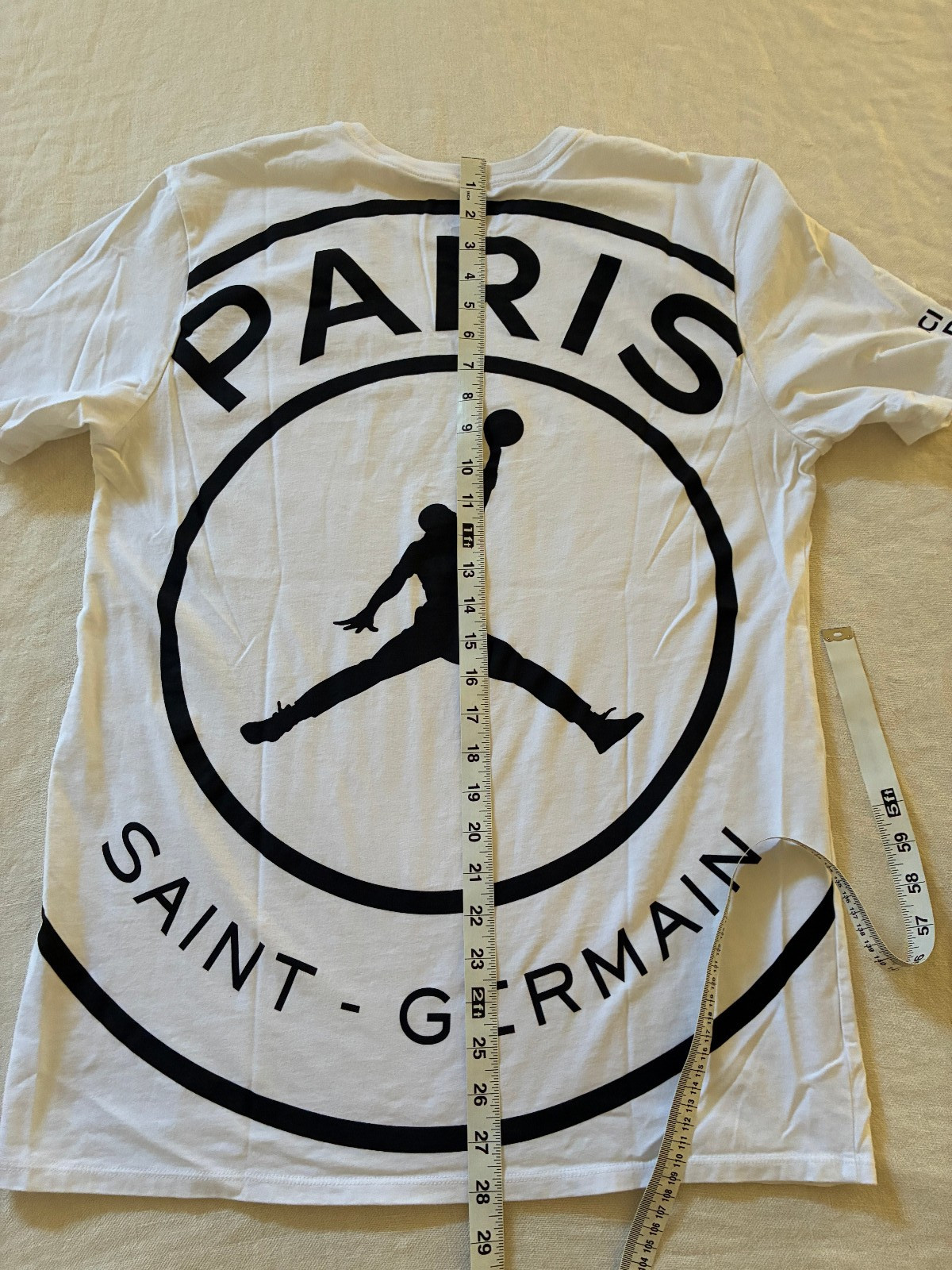 Nike Air Jordan Paris Saint-Germain Men’s PSG White Graphic T-Shirt, Size - L gallery