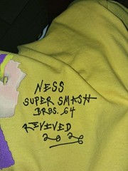 Asspizza Ness Super Smash Bros 64 Revived Yellow Tee Size XL Fast Shipping ☑️