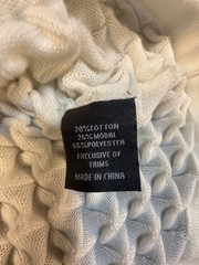 Silversilk textured knit with a raised geometric pattern; white XX (slim)